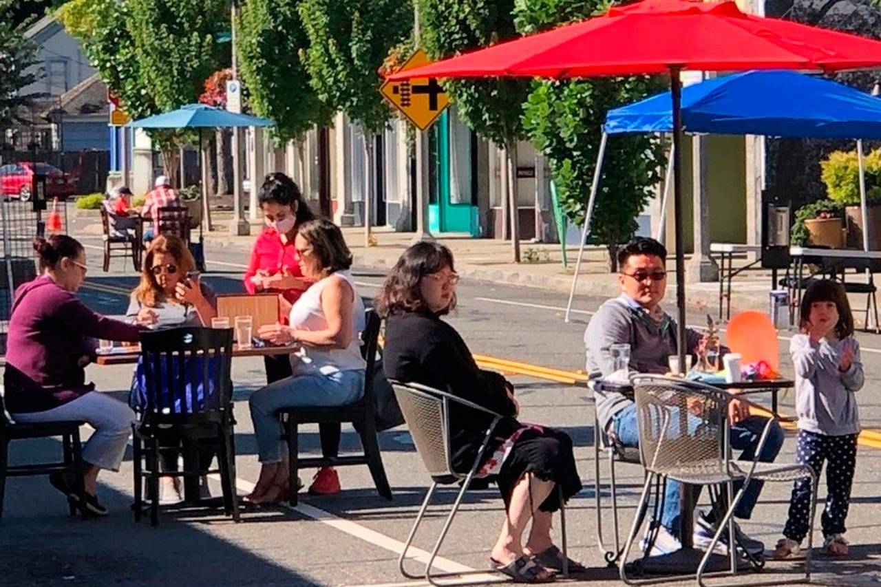 Last summer, people took advantage of the outdoor dining along First Avenue between Gowe and Titus streets in downtown Kent. In Phase 2 of the governor’s reopening plan, which was announced Jan. 28, restaurants can reopen at a maximum 25% capacity and a limit of six people per table. Photo courtesy of Kent Downtown Partnership