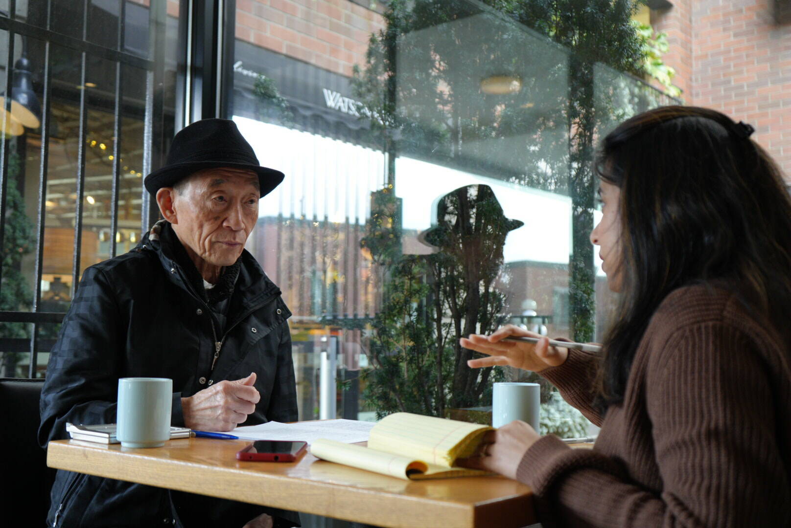 Chef Shiro Kashiba, seen in conversation with Jayendrina Singha Ray, opened the first traditional Tokyo-style sushi counter of the city at Maneki restaurant in the 1970s. (Courtesy photo)