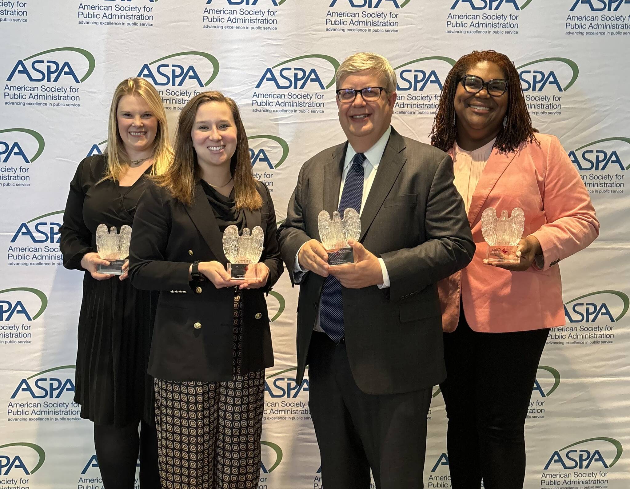 Wally Bobkiewicz stands in the front right position with three other National Public Service Award winners. (Photo courtesy of the city of Issaquah)