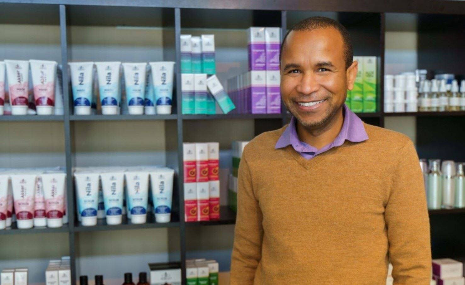 Bachir Abba stands by some of his natural Morgan Cosmetics products. Courtesy photo