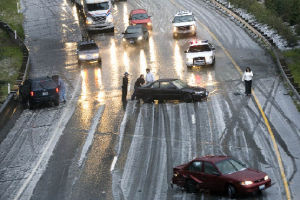 A sudden heavy hail storm contributed to a three-car collision on Interstate 90 just below Highlands Drive. The skies had opened up just before 7 p.m. Tuesday and deposited a thick layer of slick ice pellets on the road.