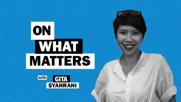 Gita Syahrani has short black hair and is wearing a button up stripped shirt with the sleeves rolled up. To her left appears the text: On what matters with Gita Syahrani.
